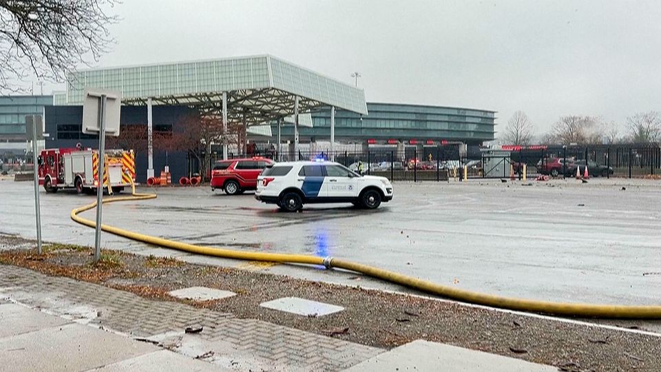 In this photo taken from video provided by WKBW-TV, emergency response vehicles block off a checkpoint at the Rainbow Bridge, Wednesday, Nov. 22, 2023, in Niagara Falls, N.Y. A vehicle exploded at a checkpoint on the American side of a U.S.-Canada bridge in Niagara Falls Wednesday, leaving two people dead and prompting the closing of four border crossings in the area, authorities said. (WKBW-TV via AP)