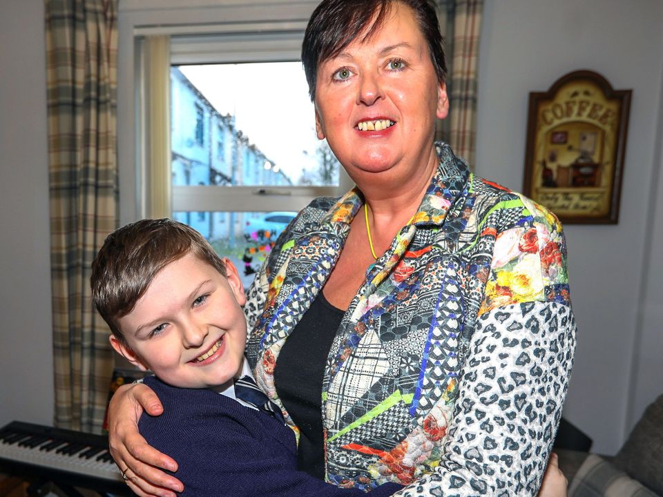 Callum having a cuddle with mum Fiona Mulhern