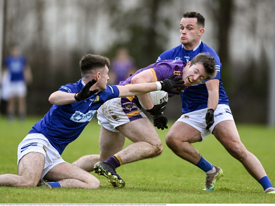 Kilmacud Crokes’ Hugh Kenny tries to get past Tiernan Corrigan, left, and Carl Gillespie of St Mary’s