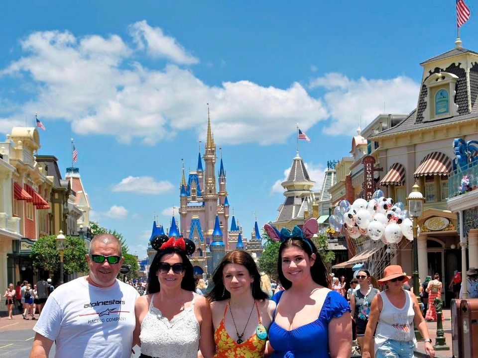 Shannon with her family at Walt Disney World Resort in Florida