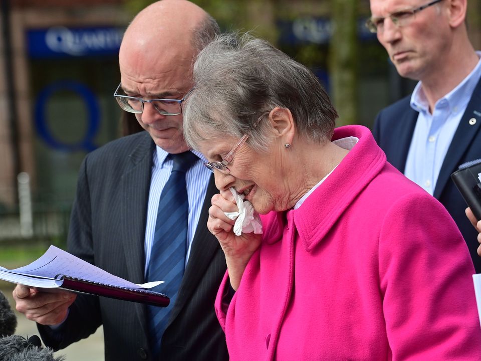 Theresa Kelly, wife of Patsy Kelly and family members with their solicitor at the ombudsman's office in Belfast