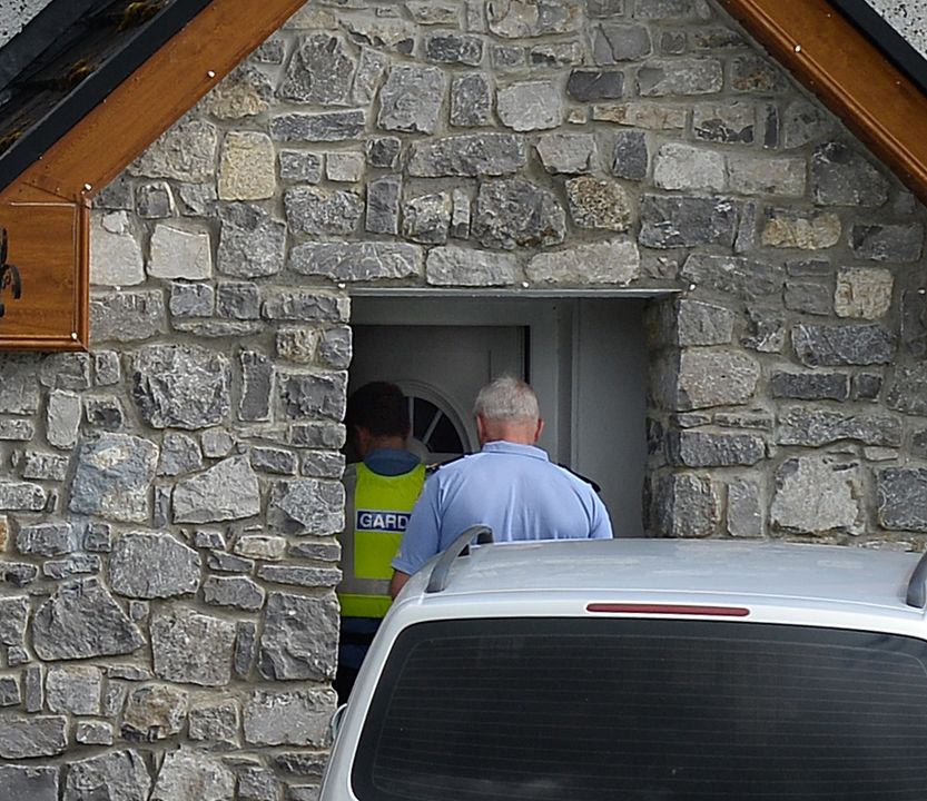 Gardai at the home of Chris Morrison’s girlfriend