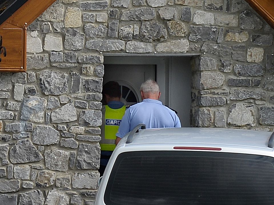 Gardai at the home of Chris Morrison’s girlfriend