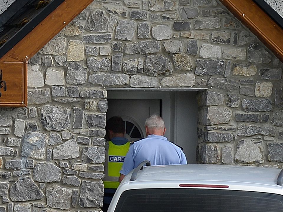 Gardai at the home of Chris Morrison’s girlfriend